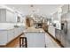Spacious kitchen featuring granite counters, stainless appliances, and an open layout at 906 Crestview Dr, Auburndale, FL 33823