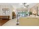 Spacious living room with seamless indoor-outdoor flow to the pool and patio area at 906 Crestview Dr, Auburndale, FL 33823