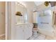 Bathroom with a single sink vanity, tub and shower combo, and neutral color scheme at 915 Ashmeade Ct, Port Orange, FL 32127