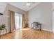 Bedroom with a vaulted ceiling, light-colored walls, and hardwood floors at 915 Ashmeade Ct, Port Orange, FL 32127