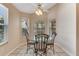 Cozy breakfast nook with large windows providing ample natural light at 915 Ashmeade Ct, Port Orange, FL 32127