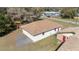 Aerial view of the exterior of the two-car garage with roof and exterior side door at 5238 Ne 1St Ave, Ocala, FL 34479