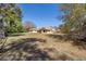 Wide open backyard with fenced-in garden area; side view of house at 5238 Ne 1St Ave, Ocala, FL 34479