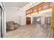 Spacious living room with loft, hardwood floors, bright windows, and neutral paint scheme at 5238 Ne 1St Ave, Ocala, FL 34479