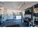 Organized garage interior showcasing laundry, utility sink, and storage, offering convenience and functionality at 8400 Mattituck Cir, Orlando, FL 32829