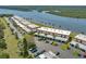 An aerial view of a waterfront condo complex with car parking at 26 Ocean Palm Villa S # 26, Flagler Beach, FL 32136