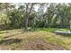 A spacious backyard has plenty of room to design your own outdoor living space at 18 Malauka Loop Pass, Ocklawaha, FL 32179