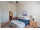 Inviting bedroom boasts a comfortable bed with an adjacent en-suite bathroom at 4410 Sw 52Nd Cir # 108, Ocala, FL 34474
