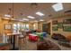 Spacious game room with tables, chairs, beanbags, and air hockey for resident enjoyment at 4410 Sw 52Nd Cir # 108, Ocala, FL 34474