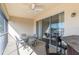 The spacious patio features tile flooring, ceiling fan, and views of the ocean at 4410 Sw 52Nd Cir # 108, Ocala, FL 34474