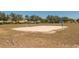 Outdoor sand volleyball court with trees in the background. Recreational space for community members at 4410 Sw 52Nd Cir # 108, Ocala, FL 34474