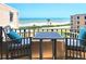 Relaxing balcony offers stunning ocean views with seating, perfect for enjoying the coastal scenery at 3370 Ocean Shore Blvd # 5020, Ormond Beach, FL 32176