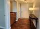 Inviting entryway features wood floors, storage cabinets, and a stylish console table with lamp at 3370 Ocean Shore Blvd # 5020, Ormond Beach, FL 32176