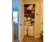 Linen closet with neatly organized shelves stocked with towels, blankets, and a Monopoly game at 5108 Caspian St, St Cloud, FL 34771
