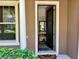 Warm, welcoming home entryway showcasing stylish door, complementary decor, and neutral tones that enhance a cozy atmosphere at 5108 Caspian St, St Cloud, FL 34771