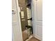 Lennox furnace inside a closet with white doors, showing the HVAC system at 5108 Caspian St, St Cloud, FL 34771