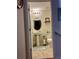 Charming half-bathroom with pedestal sink, oval mirror, and toilet at 5108 Caspian St, St Cloud, FL 34771