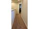 Upstairs hallway with neutral carpet and view into a room with blinds at 5108 Caspian St, St Cloud, FL 34771