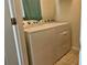 Bright laundry room featuring a full-sized, white Whirlpool washer and dryer at 5108 Caspian St, St Cloud, FL 34771