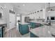 Stylish kitchen featuring granite countertops, stainless steel appliances, and modern cabinetry at 14867 Bonnybridge Dr, Orlando, FL 32826