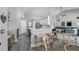 Bright, open kitchen boasts stainless appliances, large island, and breakfast bar seating at 14867 Bonnybridge Dr, Orlando, FL 32826