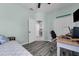 Stylish home office with hardwood floors and a view to another room at 14867 Bonnybridge Dr, Orlando, FL 32826