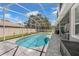 Large screened-in swimming pool offers a relaxing retreat in a private backyard at 14867 Bonnybridge Dr, Orlando, FL 32826