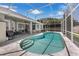 Large screened-in swimming pool offers a relaxing retreat in a private backyard at 14867 Bonnybridge Dr, Orlando, FL 32826