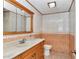 Tiled bathroom with vanity offers a functional and clean space at 8082 Sw 103Rd Ln, Ocala, FL 34481