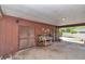 View of the spacious carport, perfect for parking and storage, featuring convenient access to the house at 8082 Sw 103Rd Ln, Ocala, FL 34481