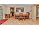 Inviting dining room with tile flooring and adjacent view into a modern kitchen at 8082 Sw 103Rd Ln, Ocala, FL 34481