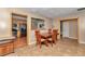 Dining room adjacent to a contemporary kitchen, perfect for Gathering meals at 8082 Sw 103Rd Ln, Ocala, FL 34481