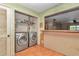 Laundry room with washer and dryer, offers convenience and functionality at 8082 Sw 103Rd Ln, Ocala, FL 34481
