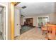 Open-concept living room with access to both dining and living spaces, great for entertaining at 8082 Sw 103Rd Ln, Ocala, FL 34481
