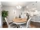 Cozy dining area open to the kitchen with stylish decor and natural light at 9945 Sw 55Th Avenue Rd, Ocala, FL 34476