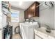 A dedicated laundry room provides practicality with storage and updated appliances at 9945 Sw 55Th Avenue Rd, Ocala, FL 34476