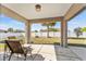 A covered patio overlooks the backyard at 9945 Sw 55Th Avenue Rd, Ocala, FL 34476