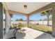 View of the patio furniture and the backyard at 9945 Sw 55Th Avenue Rd, Ocala, FL 34476