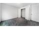 Neutral bedroom with gray carpet, white walls, and a closet at 6683 Se 3Rd Loop, Ocala, FL 34472