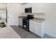 Modern kitchen with stainless steel appliances and ample countertop space at 6683 Se 3Rd Loop, Ocala, FL 34472