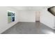 Open-concept living room with tile flooring and staircase access at 6683 Se 3Rd Loop, Ocala, FL 34472