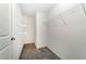 Spacious walk-in closet with ample shelving for optimal storage and organization at 6683 Se 3Rd Loop, Ocala, FL 34472