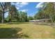 Beautiful large backyard with ample space for activities; includes a chicken coop at 18341 Nw 142Nd Court Rd, Williston, FL 32696