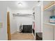Walk-in closet with shelving and rod for organized storage and convenience at 18341 Nw 142Nd Court Rd, Williston, FL 32696