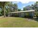 A home with mature trees offers both charm and curb appeal at 18341 Nw 142Nd Court Rd, Williston, FL 32696