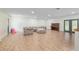 Spacious living room with plenty of space for a large couch, piano, and entertainment at 18341 Nw 142Nd Court Rd, Williston, FL 32696