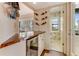 Charming bar area adjacent to a bathroom offering a convenient refreshment space at 1882 Royal Lytham Ct, Port Orange, FL 32128