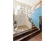 Stunning foyer with high ceilings, natural light, and a grand staircase leading to the second floor at 1882 Royal Lytham Ct, Port Orange, FL 32128