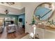 Inviting foyer with a decorative mirror and stylish accents, leading into the spacious living area at 1882 Royal Lytham Ct, Port Orange, FL 32128