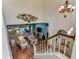 Open-concept living space with high ceilings, offering a view of the pool and outdoor area at 1882 Royal Lytham Ct, Port Orange, FL 32128